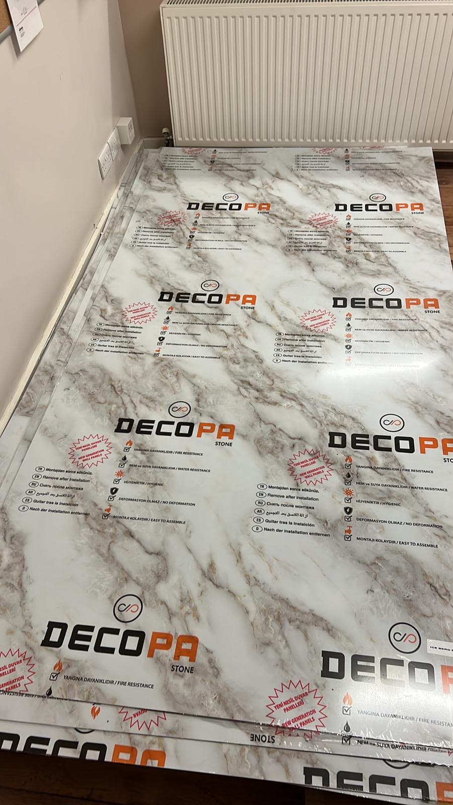 Stack of marble-effect wall panels